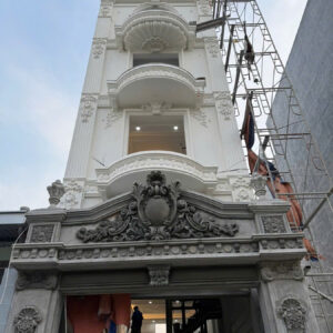 Phù điêu xi măng mặt tiền